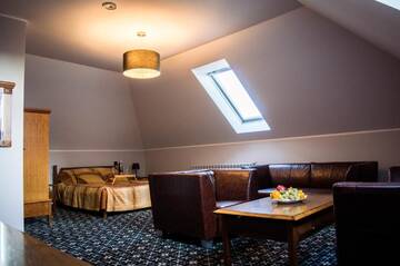 Фото номера Двухместный номер Делюкс с 1 кроватью Курортные отели Resort Jura г. Крочице 2