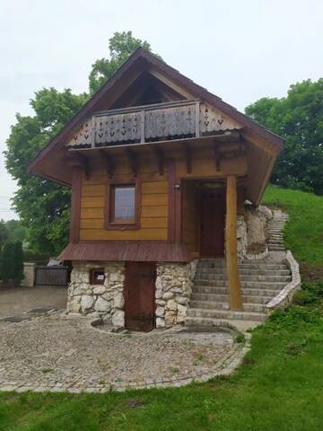 Фото номера Дом с 2 спальнями Дома для отпуска Domek w skale г. Крочице 53