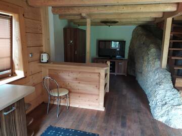 Фото номера Дом с 2 спальнями Дома для отпуска Domek w skale г. Крочице 12
