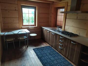 Фото номера Дом с 2 спальнями Дома для отпуска Domek w skale г. Крочице 10